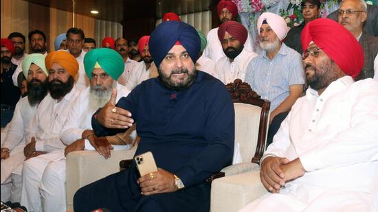 Former Congress president Navjot Sidhu interacting with mediapersons during a press conference in Bathinda on Tuesday. He said expelled former MLA Surjit Singh Dhiman was a ‘political asset’. (Sanjeev Kumar/HT)