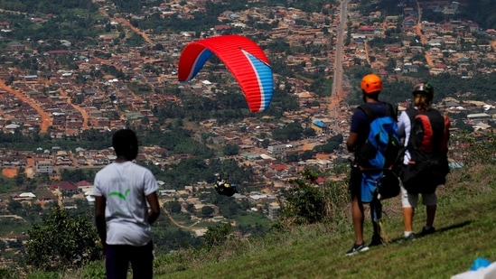 Every Easter weekend, thousands of people from around the world flock to the quiet Ghanaian towns of Kwahu and Atibie for a paragliding festival and Easter carnival that residents hope may establish the West African nation as a hub for extreme sports.(REUTERS)