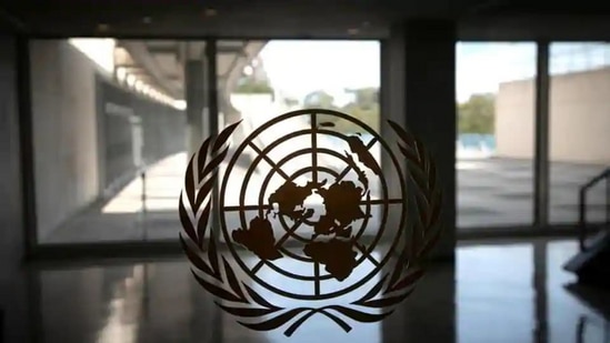 The United Nations logo is seen on a window in an empty hallway at United Nations headquarters.(Reuters)