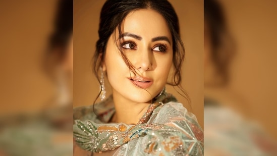 For makeup, Hina Khan went for subtle brown smokey eyes and glossy lips.(Instagram/@realhinakhan)