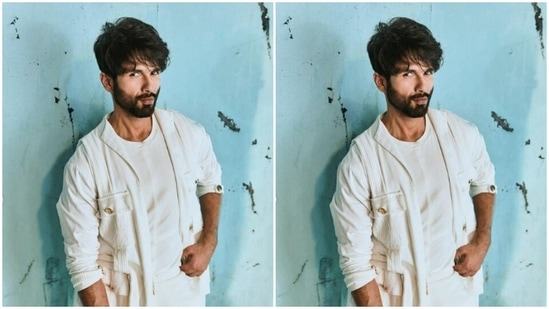 Shahid paired a white T-shirt with a white jacket and a pair of white joggers. His jacket came with golden buttons near to the sleeves.(Instagram/@shahidkapoor)