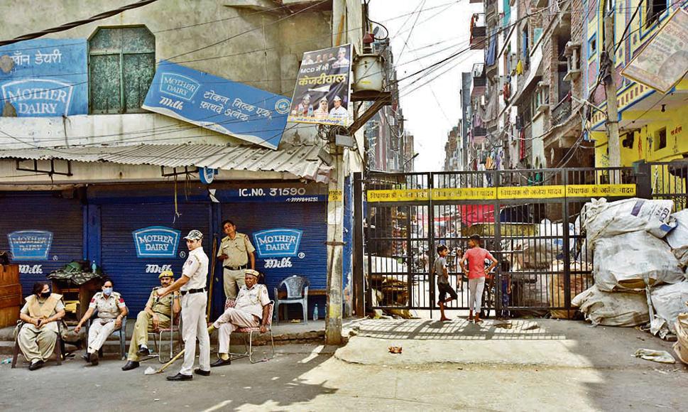 Police personnel stationed at Jahangirpuri area after communal clashes on Hanuman Jayanti, in New Delhi, India, on Tuesday, April 19, 2022. (Photo by Sanjeev Verma/Hindustan Times) Police personnel stationed at Jahangirpuri area after communal clashes on Hanuman Jayanti, in New Delhi, India, on Tuesday, April 19, 2022. (Photo by Sanjeev Verma/Hindustan Times)