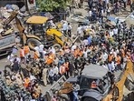 Bulldozers in violence-hit Jahangirpuri. (PTI) Bulldozers in violence-hit Jahangirpuri. (PTI)