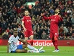 Liverpool's Mohamed Salah, right, reacts after a missed scoring opportunity during the English Premier League soccer match between Liverpool and Manchester United at Anfield stadium in Liverpool.(AP)