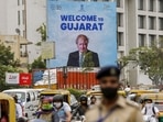 Traffic moves past a hoarding placed in Ahmedabad for the welcome of UK Prime Minister Boris Johnson ahead of his visit to India.(PTI) Traffic moves past a hoarding placed in Ahmedabad for the welcome of UK Prime Minister Boris Johnson ahead of his visit to India.(PTI)