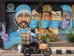 A motorist passes by a mural of frontline workers against coronavirus at RK Puram in New Delhi on July 25. Delhi’s Covid-19 recoveries have outstripped new cases on almost all days this month barring a few exceptions, after ramped-up containment and testing efforts over the past month or so. (Sanchit Khanna / HT Photo) A motorist passes by a mural of frontline workers against coronavirus at RK Puram in New Delhi on July 25. Delhi’s Covid-19 recoveries have outstripped new cases on almost all days this month barring a few exceptions, after ramped-up containment and testing efforts over the past month or so. (Sanchit Khanna / HT Photo)