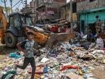 A municipal official of the rank of assistant commissioner, who directs anti-encroachment drives, said that demolition of illegal buildings and extensions on private land come under section 343 of the DMC Act. (PTI Photo) A municipal official of the rank of assistant commissioner, who directs anti-encroachment drives, said that demolition of illegal buildings and extensions on private land come under section 343 of the DMC Act. (PTI Photo)