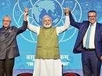 Prime Minister Narendra Modi with World Health Organization (WHO) director-general Tedros Ghebreyesus, and Mauritius Prime Minister Pravind Kumar Jugnauth join hands at the foundation stone laying ceremony of WHO Global Centre for Traditional Medicine (GCTM), in Jamnagar, Gujarat, on Tuesday, April 19, 2022. (ANI Photo)