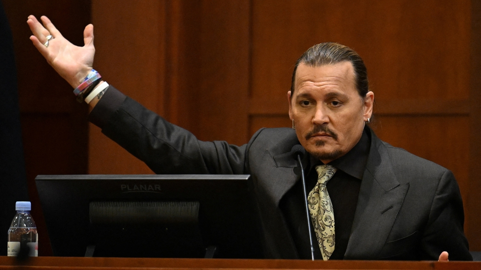 Johnny Depp takes the stand at trial: ‘Never hit a woman in my life ...