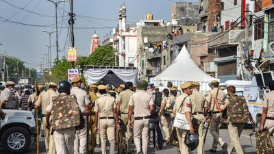 Police deployment in violence-hit Jahangirpuri. (PTI) Police deployment in violence-hit Jahangirpuri. (PTI)