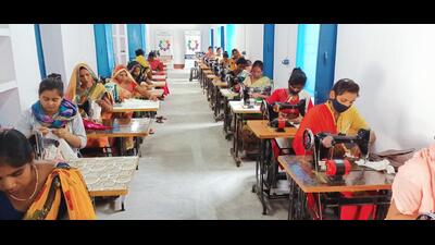 A training programme has also been organised for 69 women to learn sewing machine operation and business skills. (HT Photo)