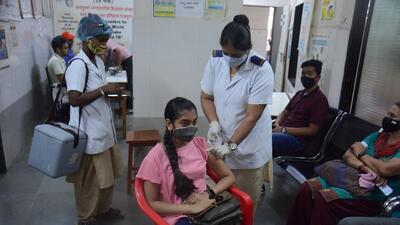 A beneficiary gets vaccinated against Covid-19 in Thane on Wednesday. Praful Gangurde/HT Photo A beneficiary gets vaccinated against Covid-19 in Thane on Wednesday. Praful Gangurde/HT Photo