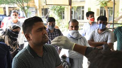 Gurugram, India - April. 20, 2022: A health worker collects a swab sample for Covid-19 test, at UPHC Poly Clinic, in Sector 31, Gurugram, India, on Wednesday, April 20, 2022. (Photo by Vipin Kumar/ Hindustan Times) (Vipin Kumar/HT PHOTO) Gurugram, India - April. 20, 2022: A health worker collects a swab sample for Covid-19 test, at UPHC Poly Clinic, in Sector 31, Gurugram, India, on Wednesday, April 20, 2022. (Photo by Vipin Kumar/ Hindustan Times) (Vipin Kumar/HT PHOTO)
