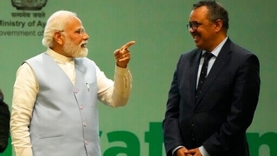 Prime Minister Narendra Modi talks with WHO director-general Tedros Adhanom Ghebreyesus during the Global Ayush Investment and Innovation Summit 2022 in Gandhinagar on Wednesday. (AP) Prime Minister Narendra Modi talks with WHO director-general Tedros Adhanom Ghebreyesus during the Global Ayush Investment and Innovation Summit 2022 in Gandhinagar on Wednesday. (AP)