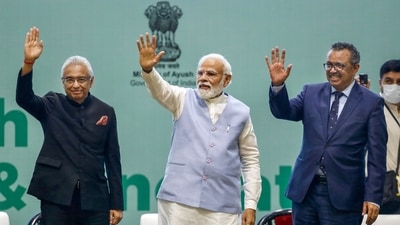 Gandhinagar: Prime Minister Narendra Modi, Director General of World health organization (WHO) Tedros Adhanom Ghebreyesus and Mauritius Prime Minister Pravind Jugnauth during the 'Global Ayush Investment and Innovation Summit', at Mahatma Mandir, in Gandhinagar, Wednesday. (PTI) Gandhinagar: Prime Minister Narendra Modi, Director General of World health organization (WHO) Tedros Adhanom Ghebreyesus and Mauritius Prime Minister Pravind Jugnauth during the 'Global Ayush Investment and Innovation Summit', at Mahatma Mandir, in Gandhinagar, Wednesday. (PTI)