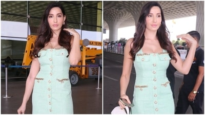 Nora Fatehi serves a killer airport look in figure-hugging mint green dress worth 32k: Check out pics and videos (HT Photo/Varinder Chawla) Nora Fatehi serves a killer airport look in figure-hugging mint green dress worth 32k: Check out pics and videos (HT Photo/Varinder Chawla)