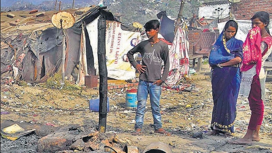 Seven persons including five children were charred to death after fire broke out at their shanty near main garbage dump of MC at Tajpur road during wee hours in Ludhiana on April 20, 2022. (Gurpreet Singh/ HT)