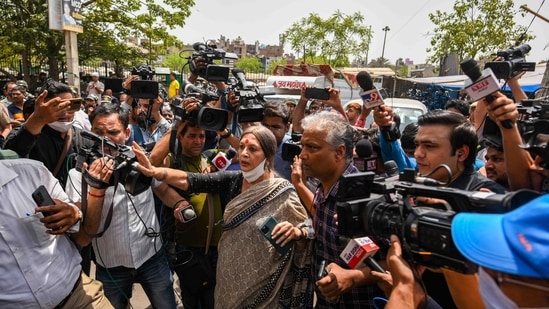 Communist Party of India (Marxist) leader and Rajya Sabha MP Brinda Karat flanked by media personnel during the anti-encroachment drive in Jahangirpuri, on April 20, 2022. After the demolition drive was halted following the Supreme Court order, the CPI(M) leader urged the people to maintain peace and harmony in the area. She was also the only opposition leader seen at the site during the demolition drive.(Amal KS / HT Photo)