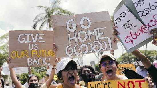 People shout slogans against Sri Lanka's President Gotabaya Rajapaksa and demand that Rajapaksa family politicians step down, during a protest amid the country's economic crisis(REUTERS)