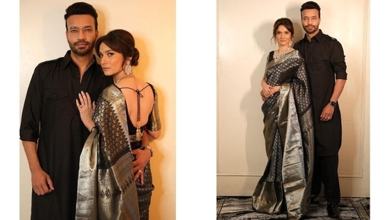 Ankita teamed the black brocade silk saree with a half sleeve blouse featuring a wide neckline, a plunging detail on the back with tassel-adorned ties, gold brocade embroidery on the sleeves, and a fitted silhouette.(Instagram/@ankitalokhande)