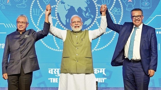 Prime Minister Narendra Modi with World Health Organization (WHO) director-general Tedros Ghebreyesus, and Mauritius Prime Minister Pravind Kumar Jugnauth join hands at the foundation stone laying ceremony of WHO Global Centre for Traditional Medicine (GCTM), in Jamnagar, Gujarat, on Tuesday, April 19, 2022. (ANI Photo)