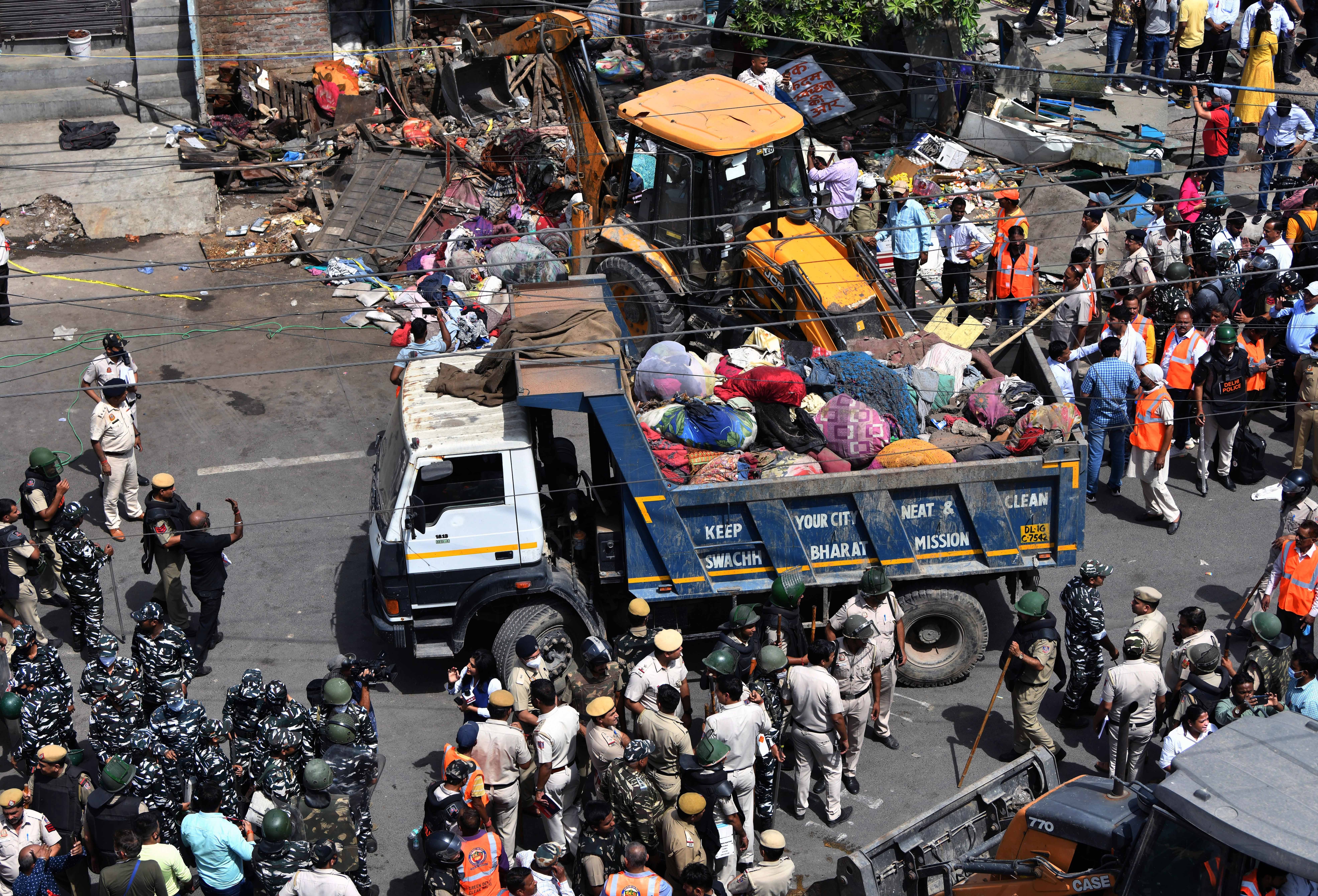 Bulldozers being used to remove illegal structures during an anti-encroachment drive by the NDMC, in the violence-hit Jahangirpuri area, in New Delhi on April 20, 2022.&nbsp; (ANI photo)