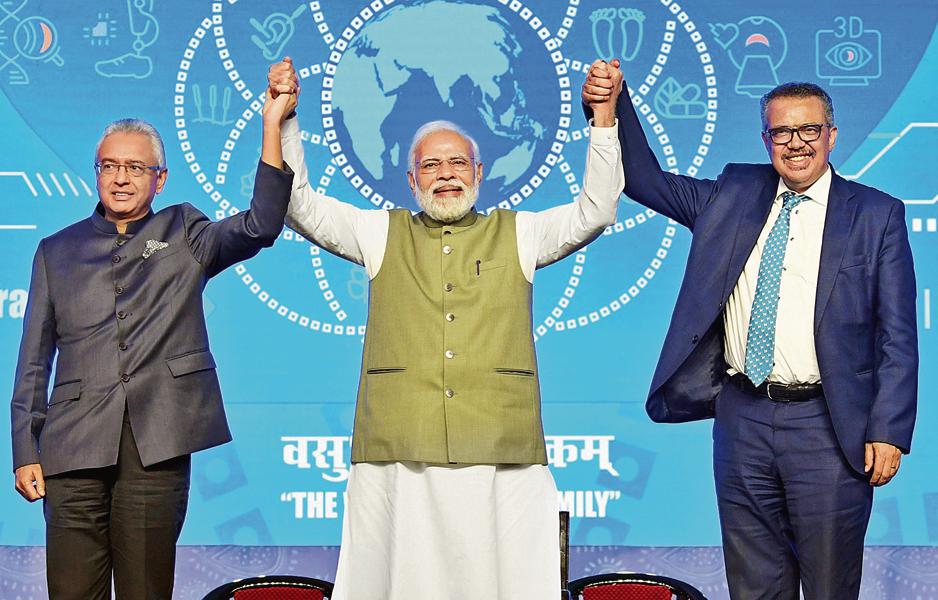Prime Minister Narendra Modi with World Health Organization (WHO) director-general Tedros Ghebreyesus, and Mauritius Prime Minister Pravind Kumar Jugnauth join hands at the foundation stone laying ceremony of WHO Global Centre for Traditional Medicine (GCTM), in Jamnagar, Gujarat, on Tuesday, April 19, 2022. (ANI Photo) Prime Minister Narendra Modi with World Health Organization (WHO) director-general Tedros Ghebreyesus, and Mauritius Prime Minister Pravind Kumar Jugnauth join hands at the foundation stone laying ceremony of WHO Global Centre for Traditional Medicine (GCTM), in Jamnagar, Gujarat, on Tuesday, April 19, 2022. (ANI Photo)