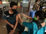 A person gets a dose of Covid-19 vaccine at a inoculation centre. (File) A person gets a dose of Covid-19 vaccine at a inoculation centre. (File)