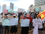 Sri Lankans hold placards demanding justice for the victims of 2019 Easter Sunday attacks outside president's office in Colombo, Sri Lanka. Sri Lankans hold placards demanding justice for the victims of 2019 Easter Sunday attacks outside president's office in Colombo, Sri Lanka.