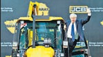 UK PM Boris Johnson waves from an excavator during his visit to the JCB factory in Vadodara. (AFP) UK PM Boris Johnson waves from an excavator during his visit to the JCB factory in Vadodara. (AFP)
