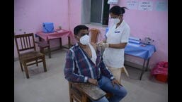 A beneficiary gets his Covid vaccine on Thursday. The Kalyan Dombivli civic body has reported only one or two Covid cases daily and its epidemic officer says there is no need to worry. (PRAFUL GANGUDE/HT PHOTO)