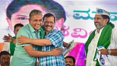 Arvind Kejriwal-led AAP inducted KRRS president Kodihalli Chandrashekar into its fold, bolstering its offence in the state. (PTI) Arvind Kejriwal-led AAP inducted KRRS president Kodihalli Chandrashekar into its fold, bolstering its offence in the state. (PTI)