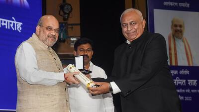 Union home minister Amit Shah confers awards during the 13th National Investigation Agency (NIA) Day programme, at Dr Ambedkar International Centre, in New Delhi, Thursday, April 21, 2022. Union MoS for Home Affairs Ajay Mishra Teni and Nisith Pramanik are also seen. (PTI Photo/Manvender Vashist) Union home minister Amit Shah confers awards during the 13th National Investigation Agency (NIA) Day programme, at Dr Ambedkar International Centre, in New Delhi, Thursday, April 21, 2022. Union MoS for Home Affairs Ajay Mishra Teni and Nisith Pramanik are also seen. (PTI Photo/Manvender Vashist)
