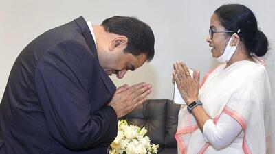 West Bengal chief minister Mamata Banerjee with Adani Group chairman Gautam Adani at the Bengal Global Business Summit in Kolkata on Wednesday. (PTI PHOTO) West Bengal chief minister Mamata Banerjee with Adani Group chairman Gautam Adani at the Bengal Global Business Summit in Kolkata on Wednesday. (PTI PHOTO)