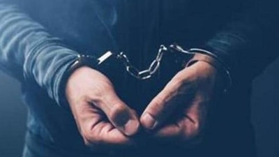 A criminal with hands cuffed. Image for representation (Getty Images/iStockphoto) A criminal with hands cuffed. Image for representation (Getty Images/iStockphoto)