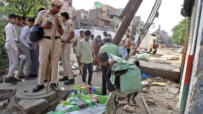 Police personnel stand guard during an anti-encroachment drive on Wednesday which was stalled by the Supreme Court. (ANI) Police personnel stand guard during an anti-encroachment drive on Wednesday which was stalled by the Supreme Court. (ANI)