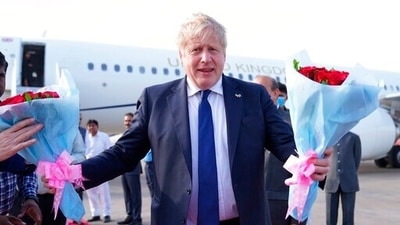 British Prime Minister Boris Johnson arrives at the Sarda Vallabhbhai Patel International airport in Ahmedabad, Thursday, April 21, 2022, (Stefan Rousseau/Pool Photo via AP) (AP)