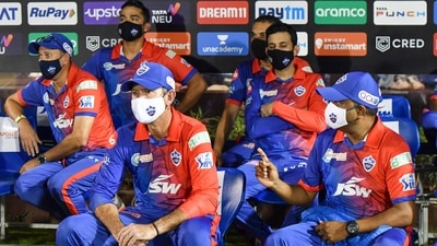 Delhi Capitals coaches Ricky Ponting, Ajit Agarkar and Praveen Amre and others sit at the team dugout (PTI) Delhi Capitals coaches Ricky Ponting, Ajit Agarkar and Praveen Amre and others sit at the team dugout (PTI)