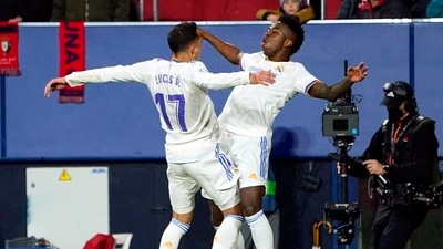 LaLiga - Osasuna v Real Madrid - El Sadar Stadium, Pamplona, Spain - April 20, 2022 Real Madrid's Lucas Vazquez celebrates scoring their third goal with Vinicius Junior (REUTERS)