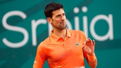 Novak Djokovic of Serbia reacts during their tennis match of the Serbia Open tennis tournament against Laslo Djere of Serbia in Belgrade, Serbia, Wednesday, April 20, 2022. (AP) Novak Djokovic of Serbia reacts during their tennis match of the Serbia Open tennis tournament against Laslo Djere of Serbia in Belgrade, Serbia, Wednesday, April 20, 2022. (AP)