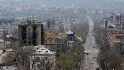 A view shows damaged buildings, with the Azovstal Iron and Steel Works plant in the background, in the southern port city of Mariupol, Ukraine. (REUTERS)