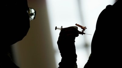 A nursing student administers a Moderna Covid-19 vaccine at a vaccination center at UNLV, in Las Vegas. (File image) (AP) A nursing student administers a Moderna Covid-19 vaccine at a vaccination center at UNLV, in Las Vegas. (File image) (AP)