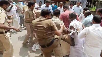 Police personnel and Congress workers engage in a clash during their protest against the K Rail project, in Thiruvananthapuram on Thursday. (ANI)