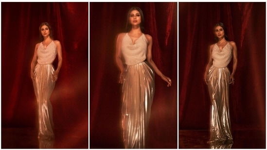Mouni Roy goes all out and wears a pearl sleeveless top paired with a pleated saree inspired skirt for one of the episodes of the show DID L'il Masters Season 5 where she will be seen as a host.(Instagram/@imouniroy)