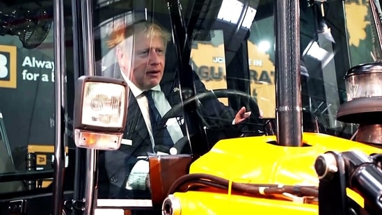 United Kingdom Prime Minister Boris Johnson during his visit to the JCB factory, at Halol GIDC in Panchmahal on Thursday.