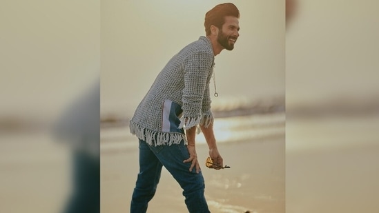 Shahid teamed the knit jacket with acid-washed and straight-fit blue denim jeans. He chose black combat boots with lace-up details, tinted sunglasses, and a sleek chain to complete his outfit for the Jersey screening event. In the end, Shahid went for a side-swept hairdo and groomed beard to round it all off.(Instagram/@shahidkapoor)
