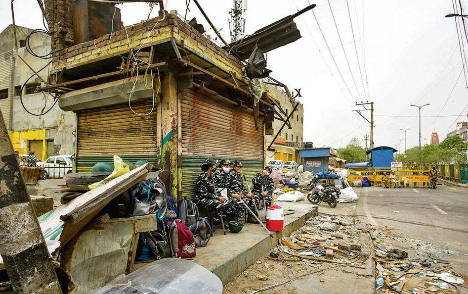 Security personnel a day after the anti-encroachment drive in violence-hit Jahangirpuri, New Delhi , India, on Thursday, April 21, 2022. (Photo by Amal KS/Hindustan Times) Security personnel a day after the anti-encroachment drive in violence-hit Jahangirpuri, New Delhi , India, on Thursday, April 21, 2022. (Photo by Amal KS/Hindustan Times)