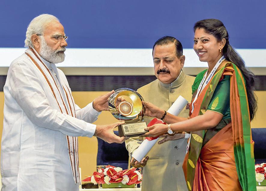Prime Minister Narendra Modi confers Prime Minister's Award for Excellence in Public Administration to Chamoli DM Swati Bhadauria during a valedictory session and awards ceremony on the occasion of 15th Civil Services Day, in New Delhi, Thursday, April 21, 2022. (PTI Photo/Kamal Singh)