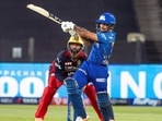 Mumbai Indians's Ishan Kishan plays a shot during the IPL 2022 match between Mumbai Indians and Royal Challengers Bangalore.
