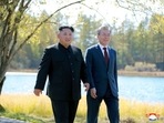 South Korean President Moon Jae-in and North Korean leader Kim Jong Un walk during a luncheon, in this photo released by North Korea's Korean Central News Agency (KCNA).
